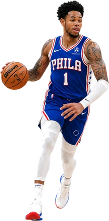A basketball player in a Philadelphia 76ers uniform driving with the ball.
